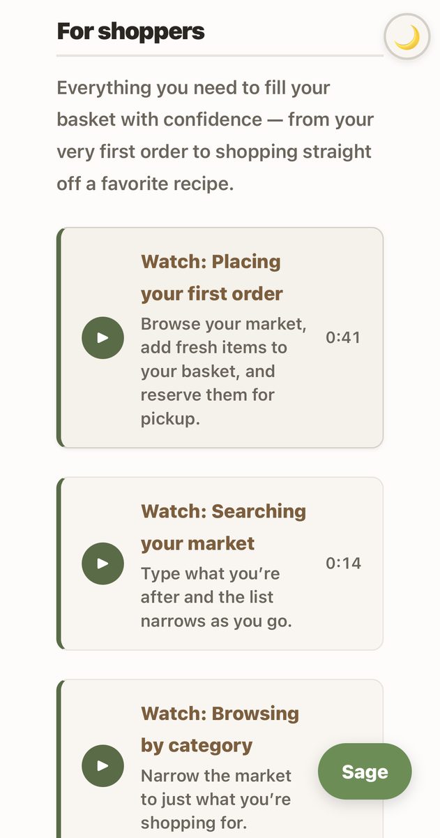 Phone screenshot of LocallyGrown's video gallery in a cream and green color scheme. Under the heading "For shoppers," three cards titled Watch: Placing your first order, Watch: Searching your market, and Watch: Browsing by category, each with a play button, a description, and a duration.